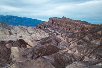 Zabriskie Point. It is a part of the Amargosa Range located east of Death Valley in Death Valley National Park in California, United States.