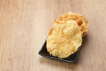 Emping, Indonesian traditional snack made from melinjo or belinjo seeds. Bitter and sweet taste
