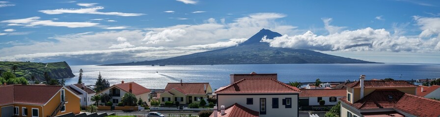 Pico Volcano / View from the island of Faial to the island of Pico with the volcano Pico, the highest mountain in the Azores and Portugal. - 582723482
