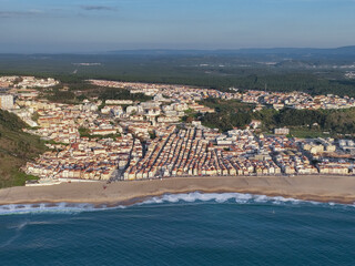 Obraz premium Nazare Town in Portugal. Beach and Cityscape. Drone Point of view.