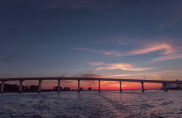 Fototapeta na wymiar Sunset in Clearwater Beach, Florida. Landscape. Gulf of Mexico. Bridge. USA