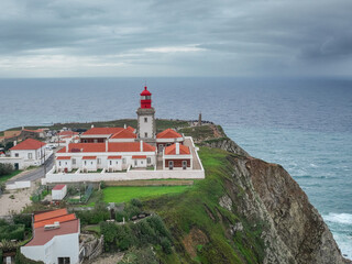 Fototapeta na wymiar Cabo Da Roca Lighthouse. The Westernmost Point of Continental Europe. Drone Point of View