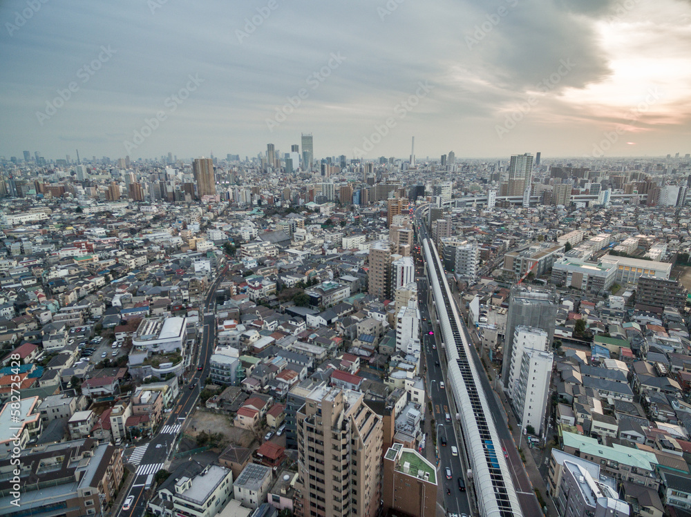 Sticker tokyo cityscape with local architecture and skyscraper in background. highway in background