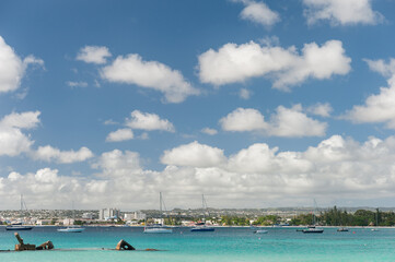 Beach in Barbados and Caribbean Sea. Full of Yachts.
