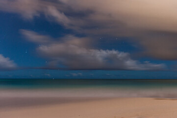 Beach in Barbados with extremely long exposure. Panning Stars in Background