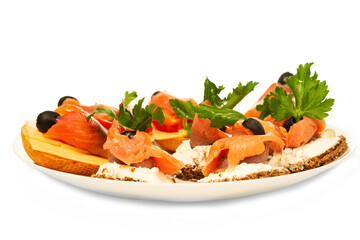 Sandwiches with salmon meat in a white plate isolate