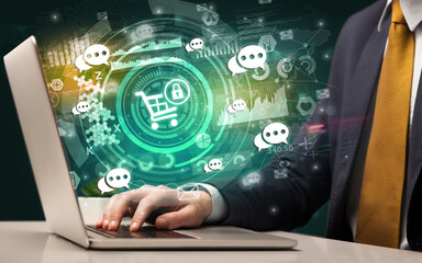 Business hand typing on a modern laptop