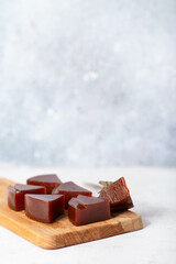 Guava sweet bars on a white plate.