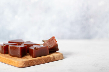 Guava sweet bars on a white plate.