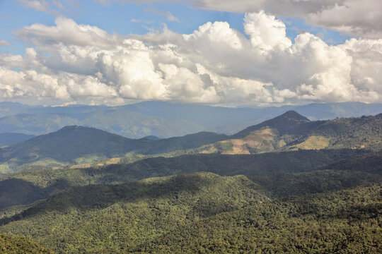 Beautiful landscape of green hills and white cumulus clouds in the state of Nagaland in Northeast India.