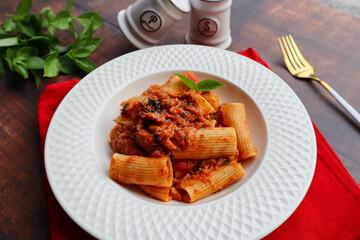 Rigatoni Pasta - Traditional Italian food with at close up view on wood table