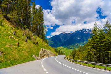 Road among Alps mountains, Klosters-Serneus, Davos, Graubuenden Switzerland