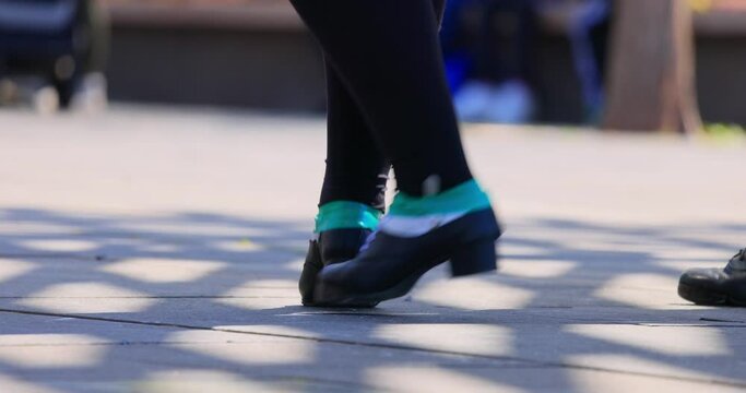 Close up slow motion shot of the shoes of Irish dance in Myriad Botanical Gardens at Oklahoma