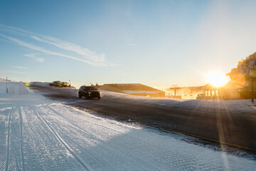 4x4 car driving on a snowy mountain