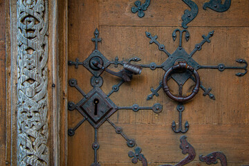 Fototapeta na wymiar The door to the Norwegian Stave Church Vang Steive in Poland