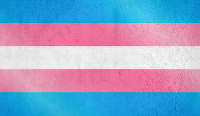 Transgender symbol flag banner over concrete texture background