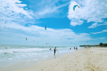 Kitesurfers at Mui Ne beach, Vietnam (Mũi Né beach is one of the best kitesurfing locations in Asia).