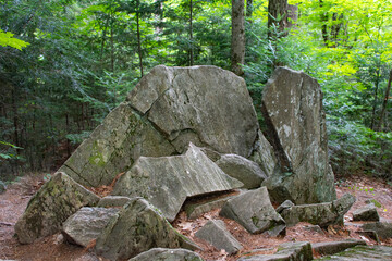 Destruction of a large rock in the middle of the forest