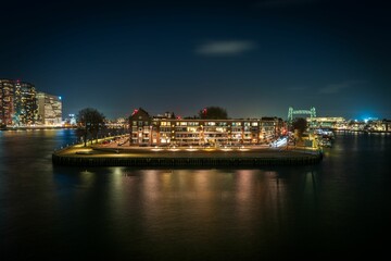 Scenic view of highrise buildings and the city skyline with lights at night