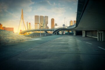 Scenic view of the beautiful architecture of the Erasmusbrug bridge seen during the sunset
