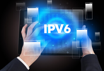 Close-up of a hand holding tablet