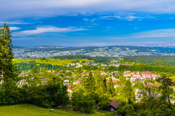 Fototapeta premium Houses and forests with meadows in Langnau am Albis, Horgen, Zurich, Switzerland