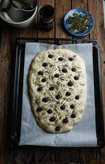 cooking focaccia with olives and rosemary