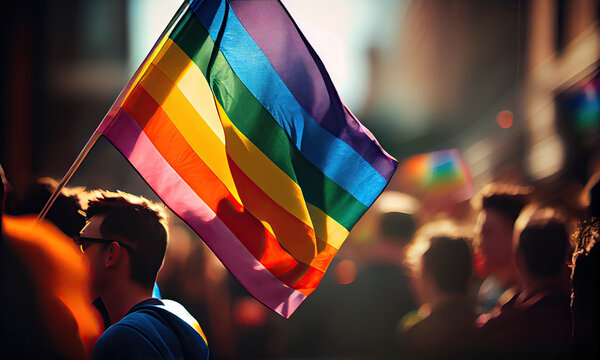 A man in a rainbow flag waves in the crowd, generative AI
