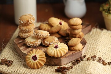 Closeup of delicious cookies of wooden board