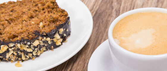 Zucchini dough and cup of white coffee on board. Delicious dessert