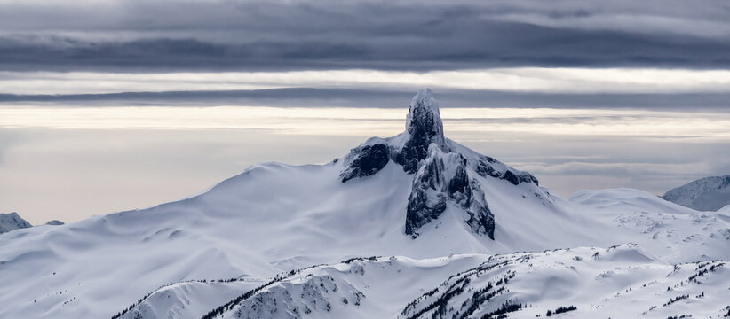 Snow covered Canadian Nature Landscape Background. Black Tusk. Winter Season in Whistler, British Columbia, Canada. From Blackcomb Mountain.