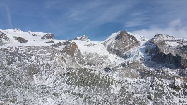 Aerial of snowy Monte Rosa glacier Breithorn, Pollux, Castor peaks