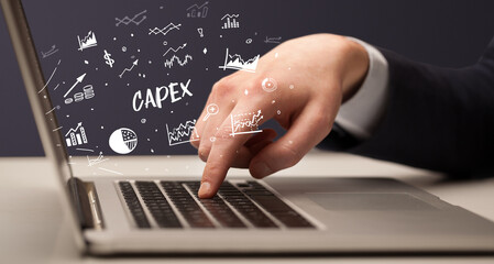 Obraz na płótnie Canvas Businessman working on laptop, business concept