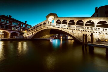 Fototapeta na wymiar Beautiful sunrise over the Rialto bridge in Venice, Italy.