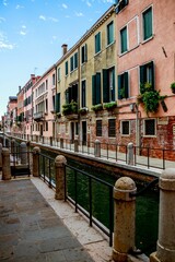 Fototapeta na wymiar Canal and buildings in Venice, Italy