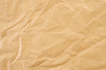 Abstract brown crumpled creased recycle paper texture background
