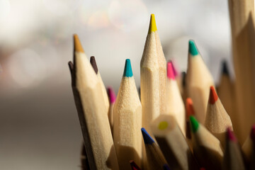 pencils on wooden background