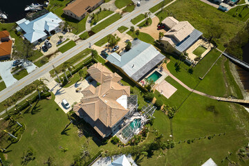 Hurricane Ian destroyed house in Florida residential area. Natural disaster and its consequences