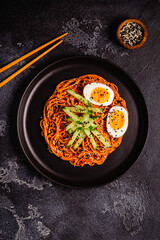 Korean traditional food, cucumber and boiled egg cold spicy noodles.