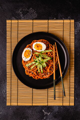 Korean traditional food, cucumber and boiled egg cold spicy noodles.