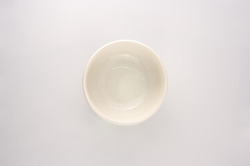 Porcelain cup on white background.