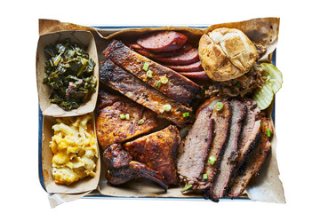 texas bbq style tray with smoked beef brisket, st louis ribs, chicken and hot links isolated and shot from top view - 582797628