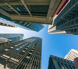 Fototapeta na wymiar Skyscrapers. Reflective skyscrapers, business office buildings. LOW ANGLE VIEW OF skyscrapers AGAINST SKY. Downton San Francisco. 
