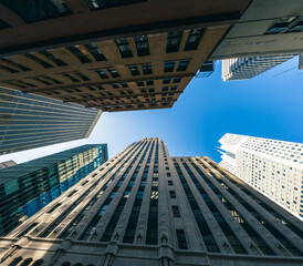 Skyscrapers. Reflective skyscrapers, business office buildings. LOW ANGLE VIEW OF skyscrapers AGAINST SKY. Downton San Francisco. 