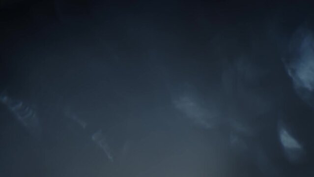 Super Slow Motion Shot of Blue Spectrum Abstract Bokeh Light Moving