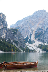Pragser Wildsee, Lake Prags, Lake Braies, Lago di Braies, Prags Dolomites in South Tyrol, Italy; Boat rental in Pragser Wildsee; Beautiful Lake in Italy with Mountain in the Background; Italy Tourists