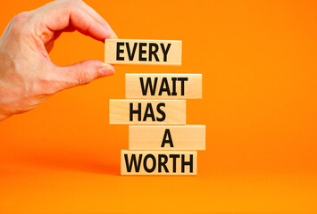 Every wait has a worth symbol. Concept words Every wait has a worth on wooden blocks. Beautiful orange table orange background. Businessman hand. Business Every wait has a worth concept. Copy space.