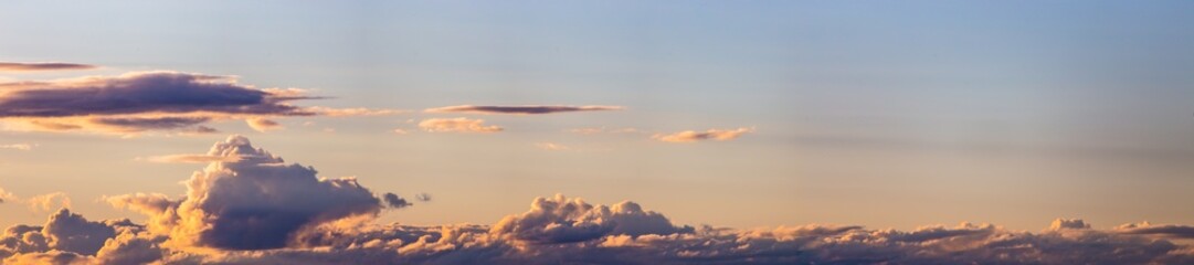 Sky panorama. Beautiful dramatic big clouds in the sky. Landscape of the power of heaven and nature. Copy space