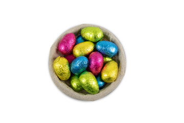 Fototapeta na wymiar Chocolate Easter eggs in a basket isolated on white.