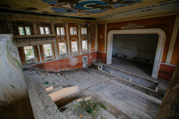 Old abandoned ruined stage theater or cinema hall